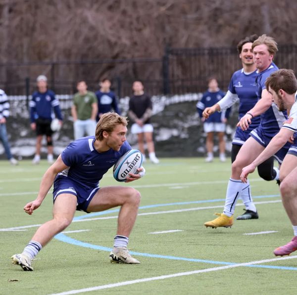 Two Rugby players walking together